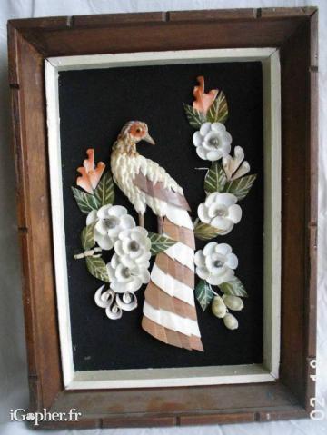 Tableau avec oiseau en relief