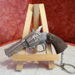Porte-clés Pistolet Colt Cobra à amorce
