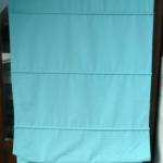 Store bateau réglable bleu avec pompon