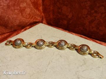 Bracelet en maille avec des boules argenté