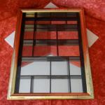 Vitrine murale (17 compartiments)